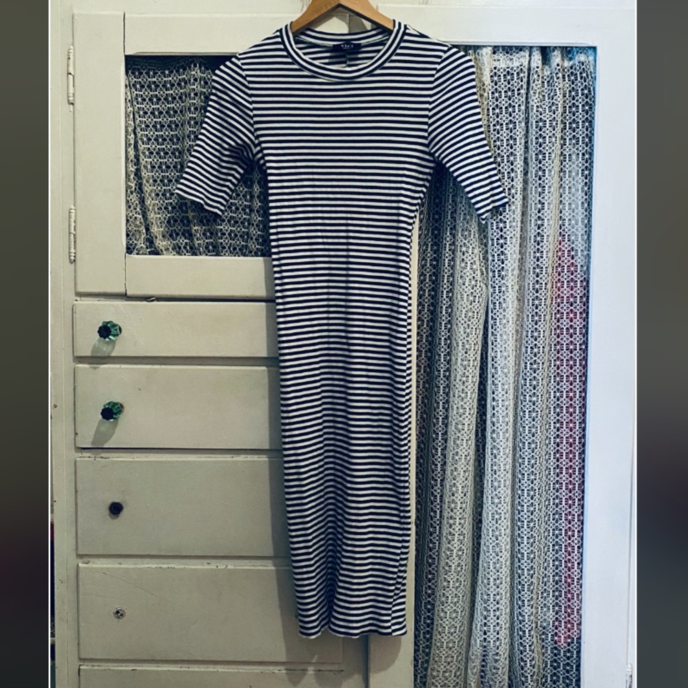 Blue and white striped body hugging dress